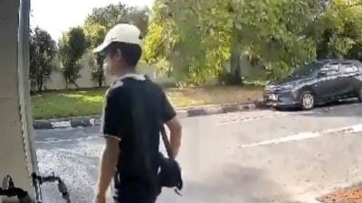 电眼全拍下．贼徒闯店偷手提袋