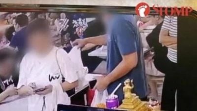 妇打包食物放桌上 涉被男子顺手取走 警在调查