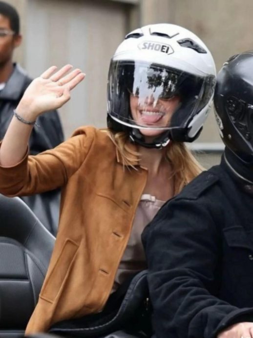 为赶看秀骑乘重型摩托车 艾玛华森吐舌成最萌插曲