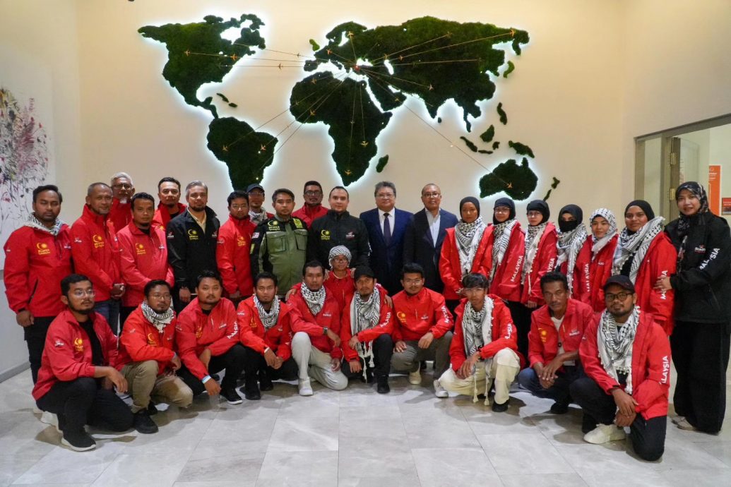 全国图与文 遭以扣留23大马人回国