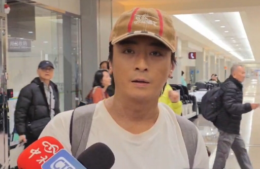 坤达返台一落地就遭逮 神情黯然点头闪兵