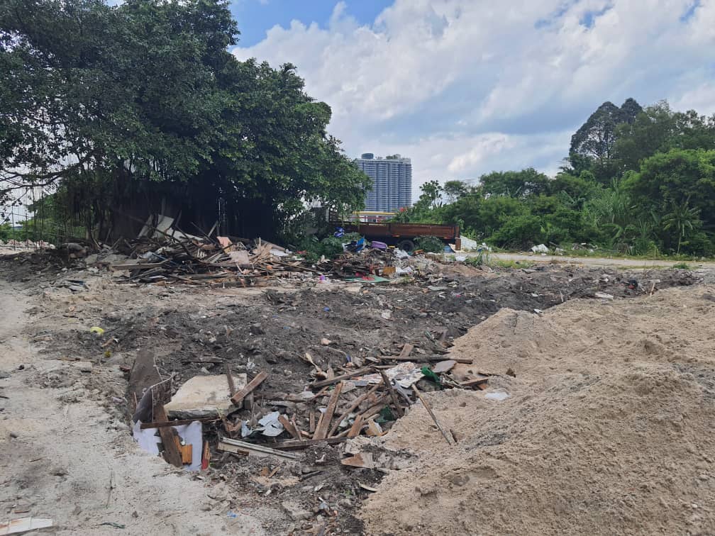 大都会-余保凭/有关木屋区废料处理课题