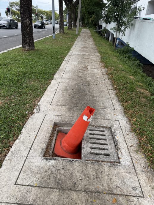 大都会封面副/雪州民政党：行人道沟渠陷阱