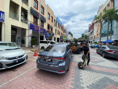 王城市厅：截至8月 充公拖走1474违例车