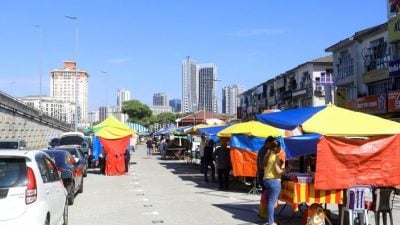 重组摊位提升道路修沟   蒲种山庄早市巴刹小贩赞