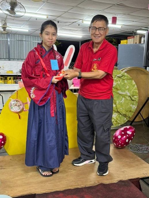 宜力佛教会庆中秋 老少齐齐走猫步