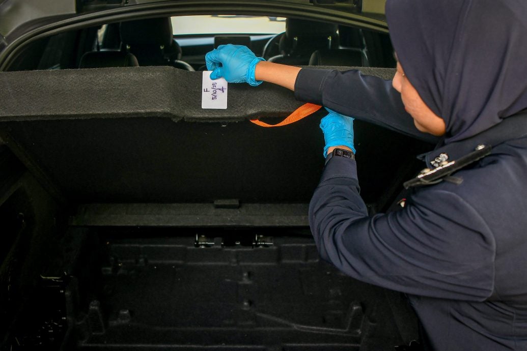 封面图与文 改装豪华车跨州运毒