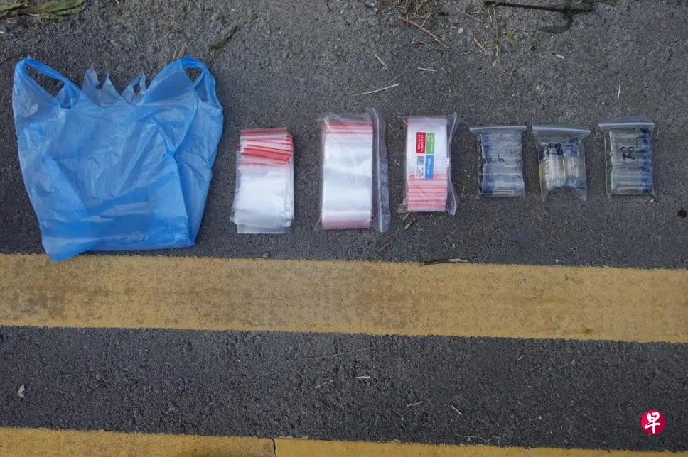 *已签发*柔:狮城二三事:车逆停路中被搜出“丧尸烟弹” 狮城31岁男子被控
