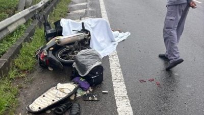 雨中骑摩托失控翻覆  骑士当场身亡