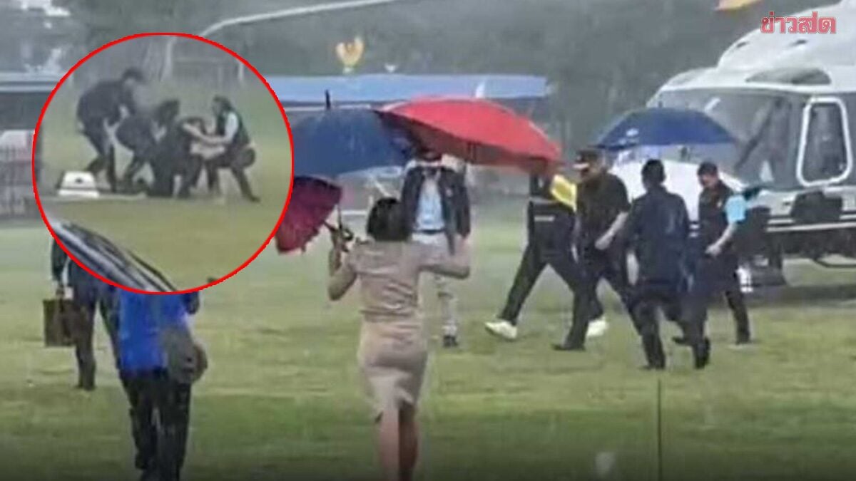 泰相飞北部视察水患灾情 下直升机摔倒头著地