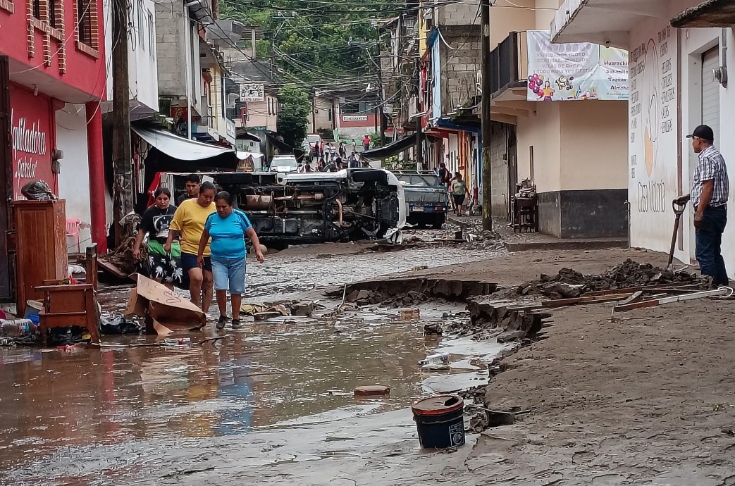 看世界)墨西哥世纪暴雨引洪灾山崩 31州至少41人死