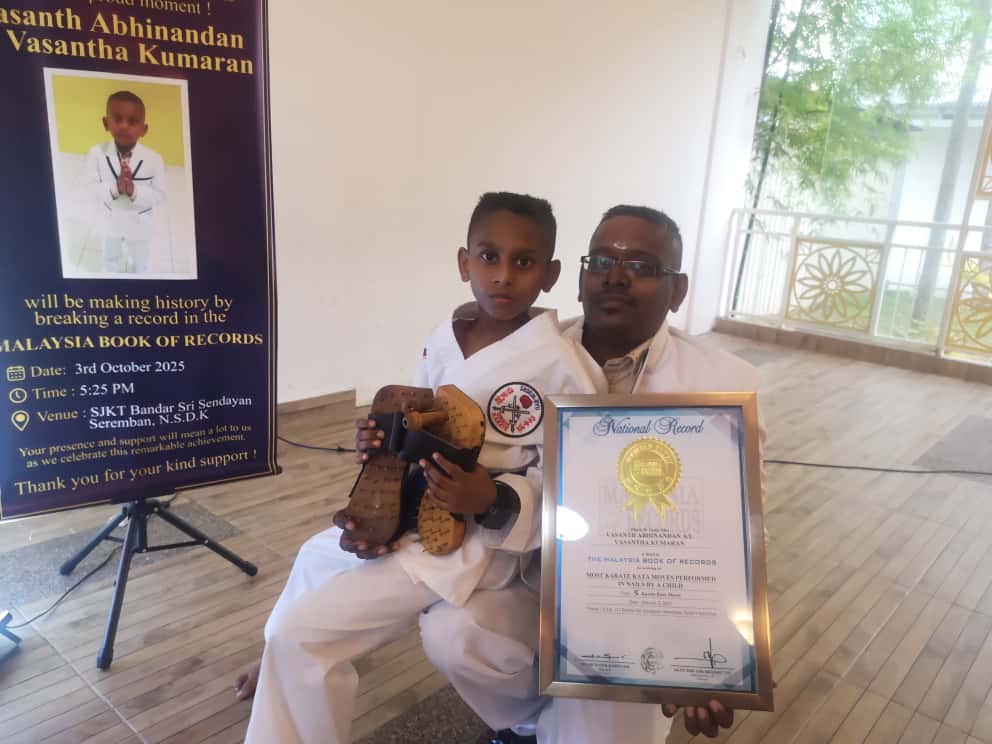 穿钉鞋苦练空手道击破极限 8岁男童靠毅力创下大马纪录