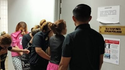 被控线上贷款诈骗 12男女俯首认罪
