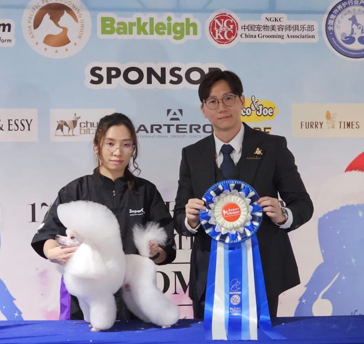 (15/10见报)大都会-特职世界 凌咏欣-宠物美容导师/14图