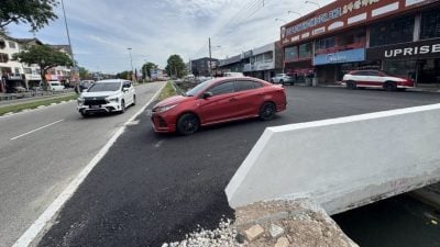 原路口全面关闭  玛琳柏迈花园新路口改双向