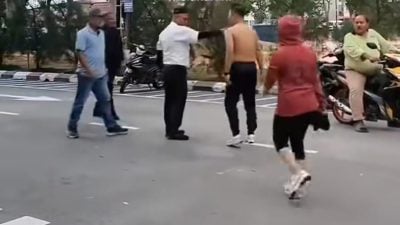 因妻子头巾问题   商人保安争执殴斗