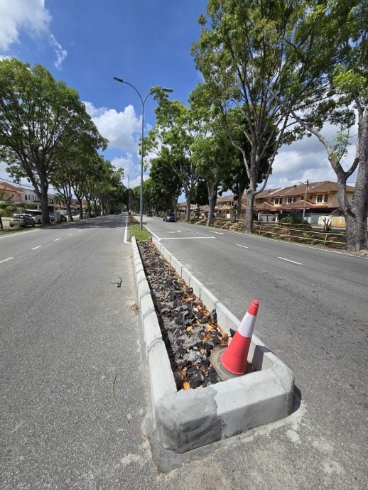 （古城第六版主文）工程局10万在5区9路口设永久安全岛保安全