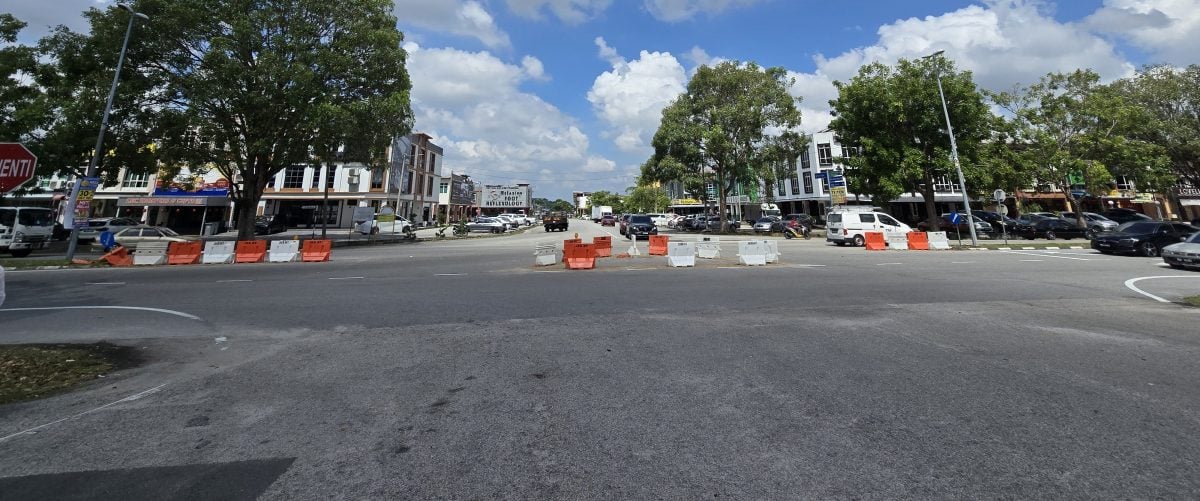 （古城第六版主文）工程局10万在5区9路口设永久安全岛保安全