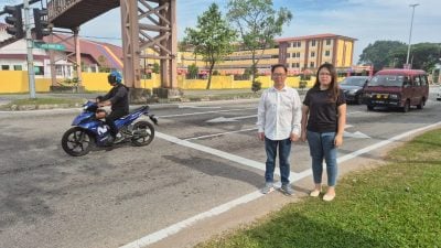 刘志俍:主要干道交通灯路口   建议增设摩托等候格