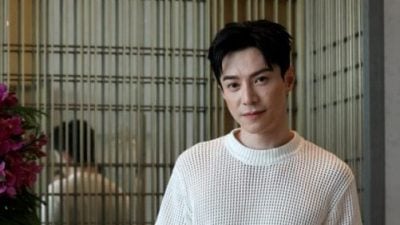 曾越堤念书 也曾租过低收入组屋  王冠逸忆艰苦岁月　
