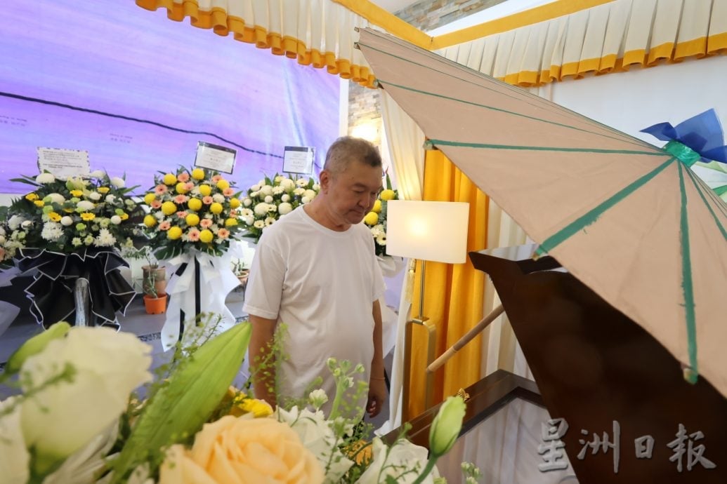 全:拿督斯里黄崇洸的父亲的黄世龙