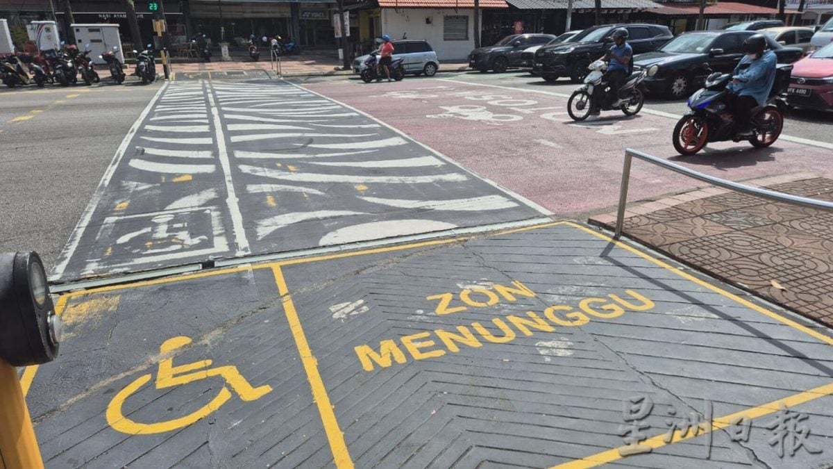 (古城)刘志俍建议高交通流量交通灯路口,增设摩托车等候格