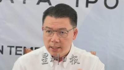 Housing Minister Nga Kor Ming apologises over ” I will call your editor-in-chief” remark