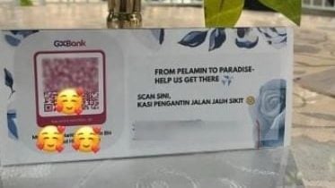 婚礼摆QR码收“蜜月费” 宾客傻眼：好像乞讨！