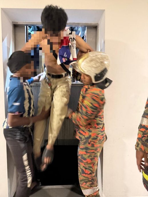 7人受困酒店公寓电梯 消拯员破门救人