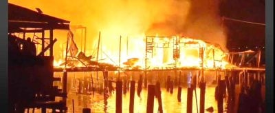 疑电线短路 . 水村火患烧毁12屋