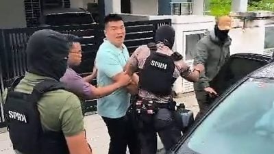 雪土团：未出示身分 过度上铐   “反贪会执法合理？”