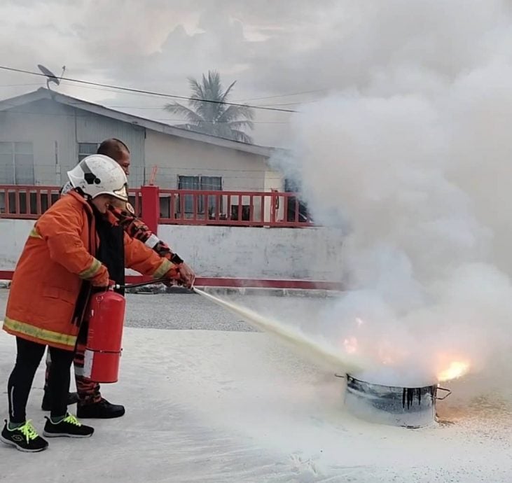 东(已签):狮子会308-B1区域第一专区与哥打峇鲁消拯局联办“防火讲座以及示范”