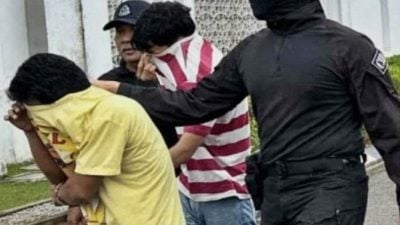 涉抢劫和打伤买鱼老妇 男子和继子被控