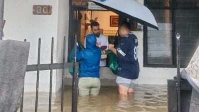 启动赈灾机制 登马华深入灾区送援助