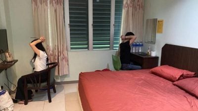 酒店内藏诈骗大本营 警察突击逮捕8中国男女