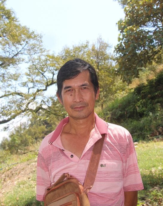 东：（未签发）不让榴梿落地损坏果肉，绑榴梿是品质管理一环