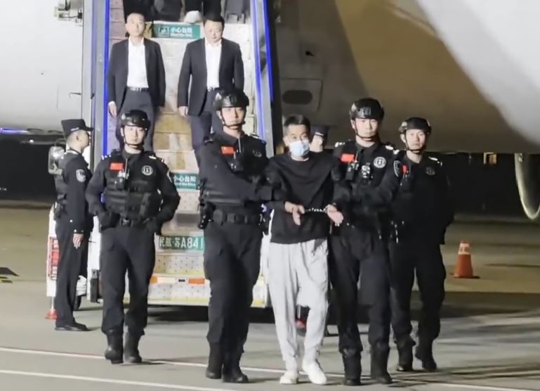 佘智江押抵南京正式逮捕 华称将加强打击网赌电骗