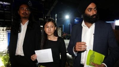 沙议员资金归还指控案 | 刁健城妻子报案指控   “官员破门粗暴执法”