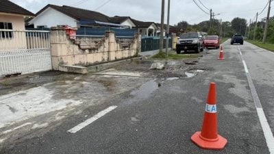 地下水流动致常路面积水   荣丰园住区将增设涵洞