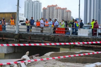 隆市局官员实地考察   要解决泗岩沫民生问题