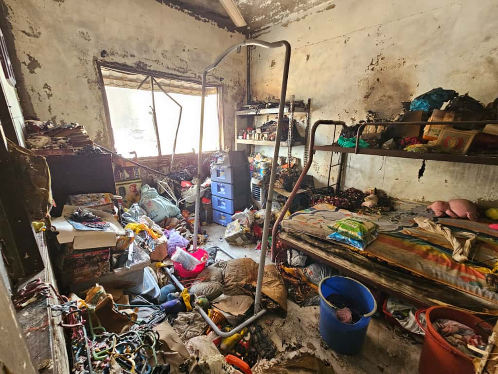 大都会-罗盛年探望火灾灾黎