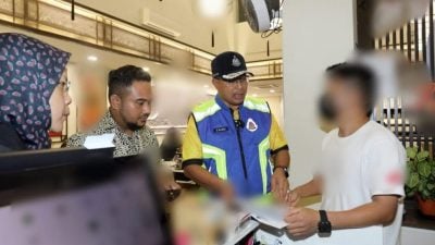 灵市SS2商区店招牌违规  屡劝不改 9店各罚1000