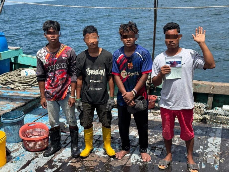 大都会/APMM扣查违规渔船和4无证缅甸人/2图