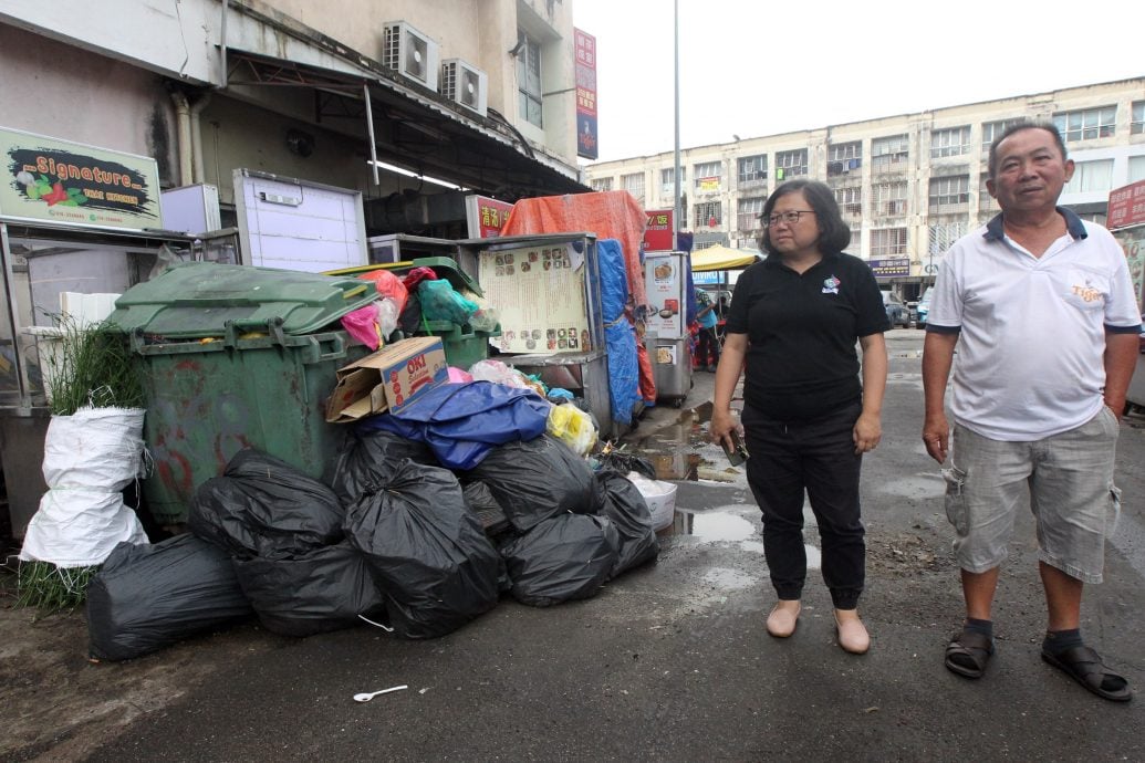 大都会/副文/李燕韵-吁商家不要额外给垃圾费