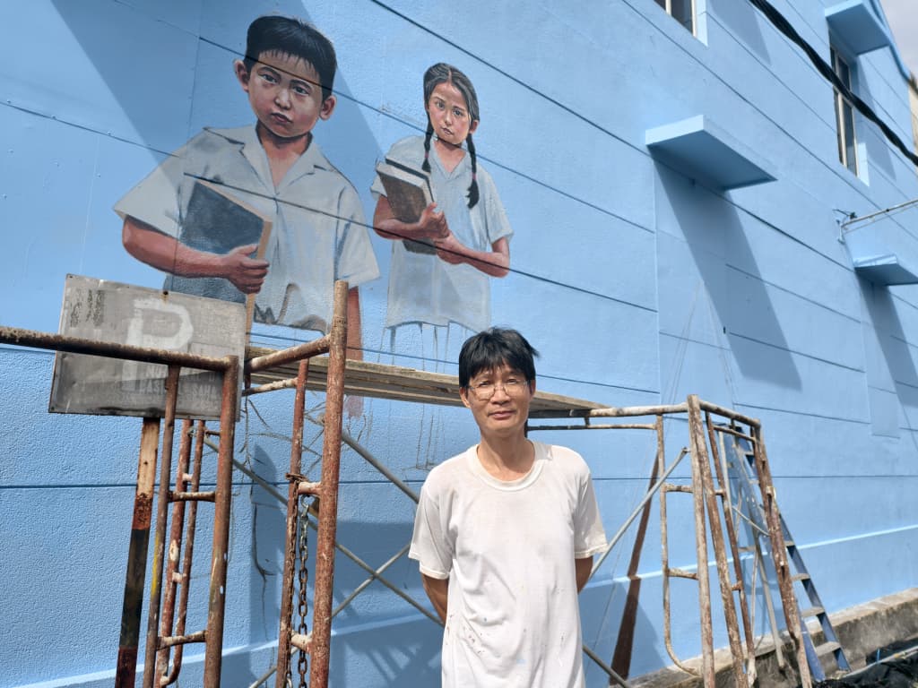 已签发 柔:特稿:枕着铁轨的上学路 40年代求学路壁画重现