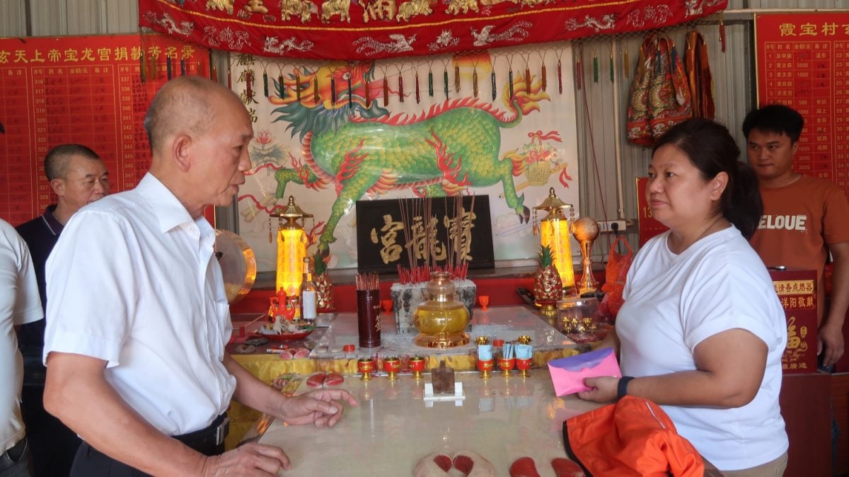 **已签发**柔︰封面:特稿〡下南洋供奉百余年 符袋回原乡安溪族亲争睹