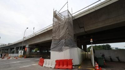 爬鹰架闯地铁轨道拍视频   狮城17岁少年认罪