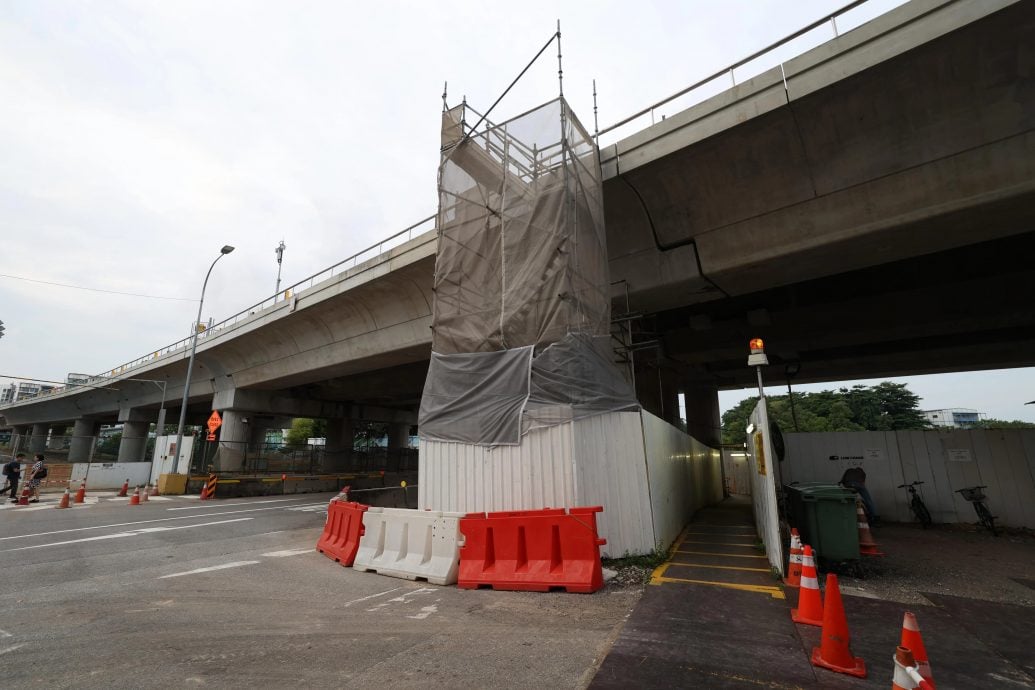 *已签发*柔：狮城二三事：爬鹰架闯地铁轨道拍视频  狮城17岁少年认罪