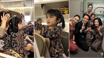 视频 | 狮城女童化身“小空姐”  穿新航制服登机萌化全场