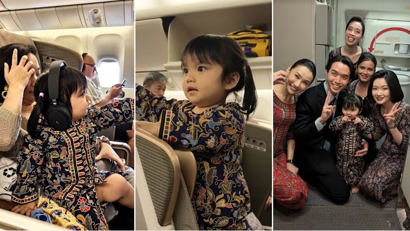 *已签发*柔:狮城二三事:狮城女童化身“小空姐” 穿新航制服登机萌化全场